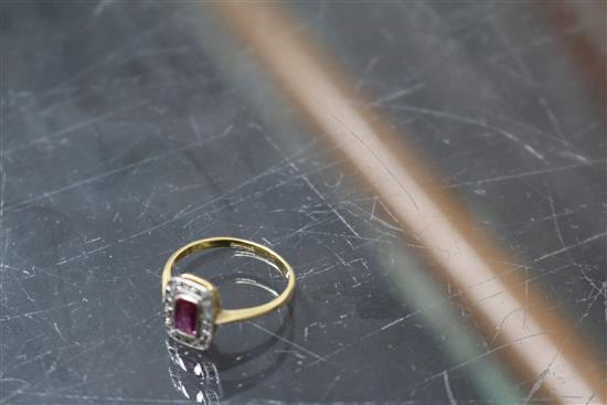 A 1920s/1930s 18ct gold and platinum ruby and diamond tablet ring, size M.